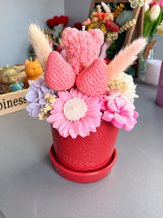 Pink bear in middle of pink flowers